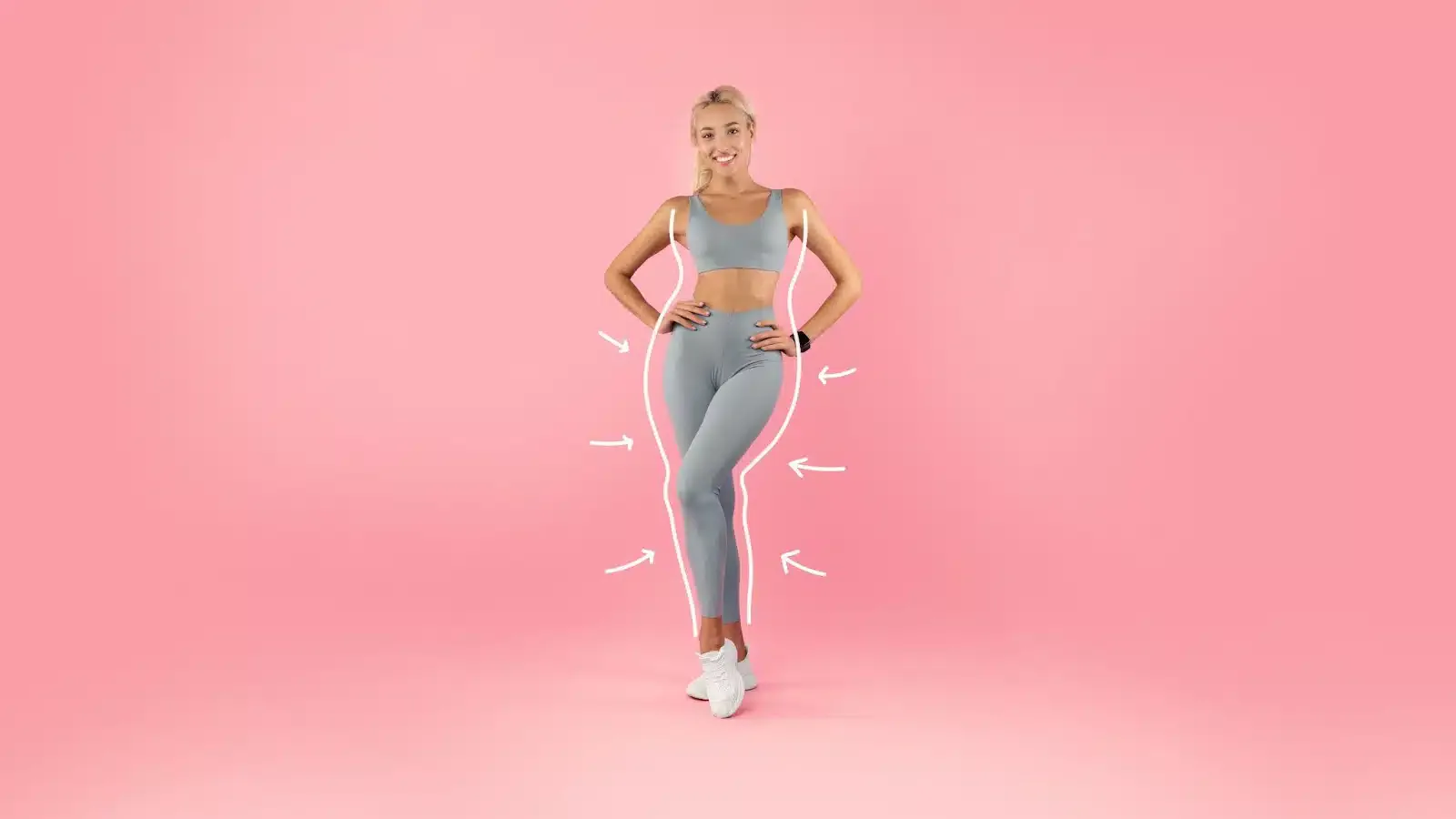 A woman in a grey sports bra and leggings, embodying a weight loss journey with Semaglutide as her solution.